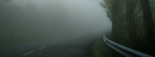 foggy road, hard to see what is around the corner